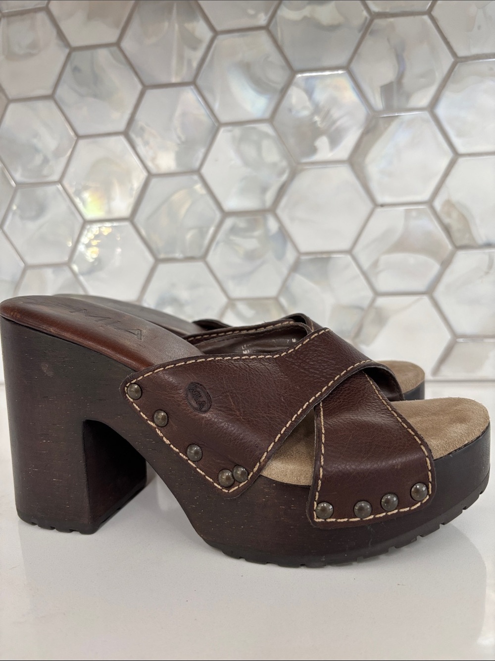 MIA wooden platform mules.